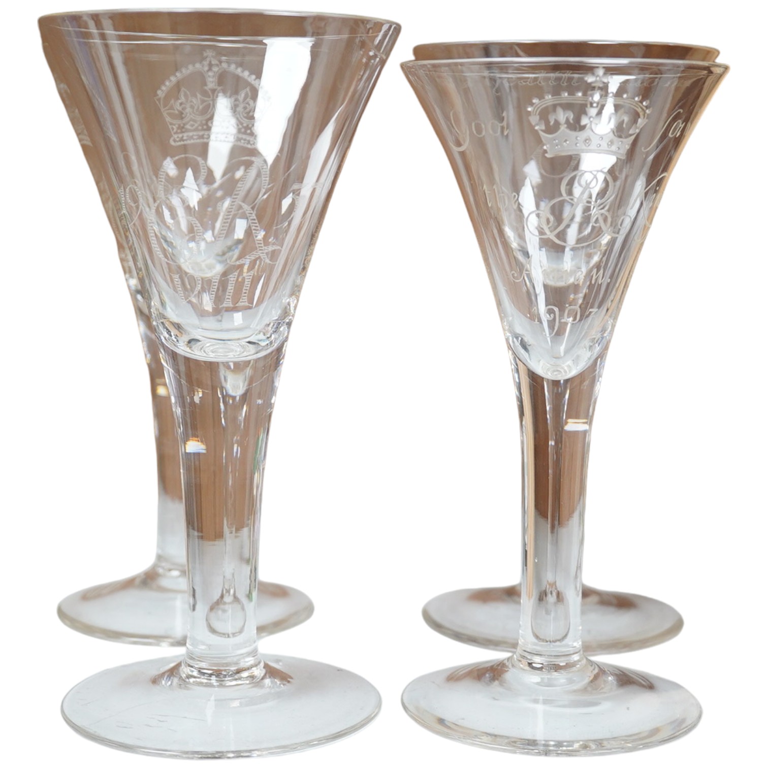 A set of four Whitefriar's etched royal commemorative goblets, tallest 20cm high. Condition - good